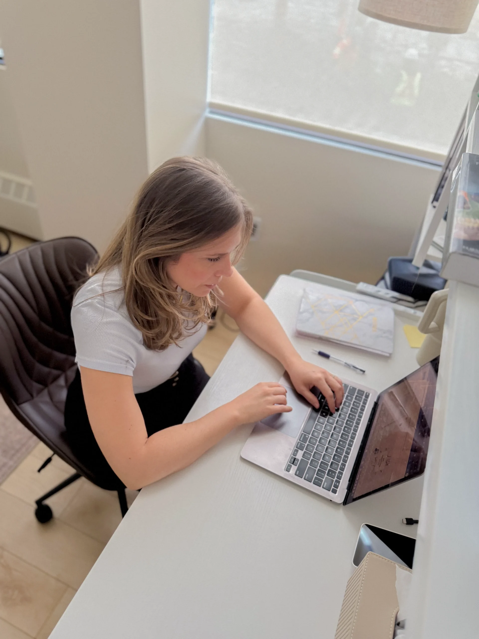 osteopath female working at desk